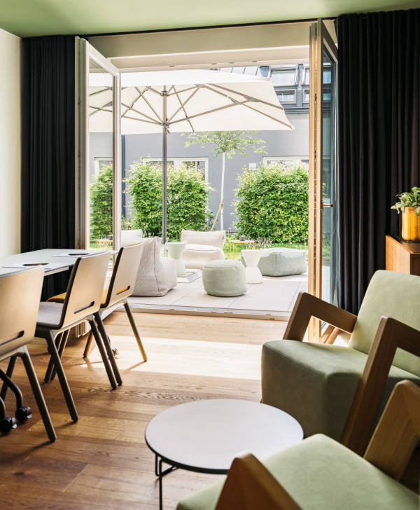 View of the garden in a seminar room at Hotel Schani UNO City