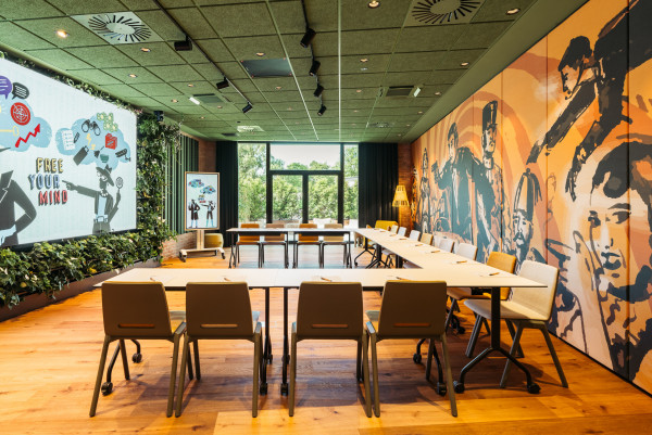 U-shaped seating in a seminar room at Hotel Schani UNO City